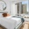 large bedroom with large windows